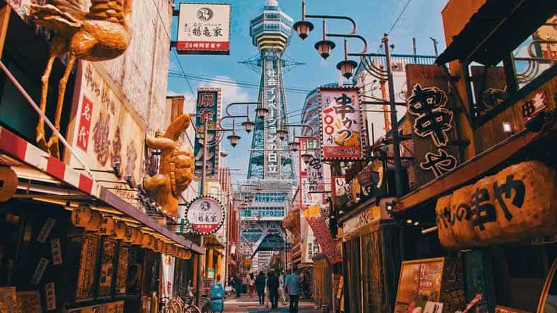 People walking down streets of Shinsekai in Osaka, Japan