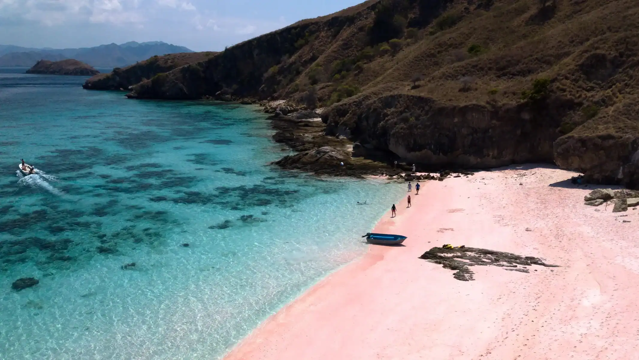 Pink Beach in Komodo Island surrounded by the hill