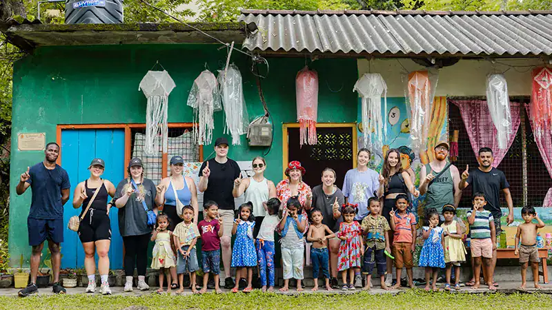 Travellers visiting local school in Sri Lanka