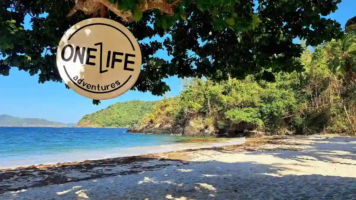 port-barton-beach-palawan-one-life One Life Adventures sign hanging over a private beach camp near Port Barton, Palawan